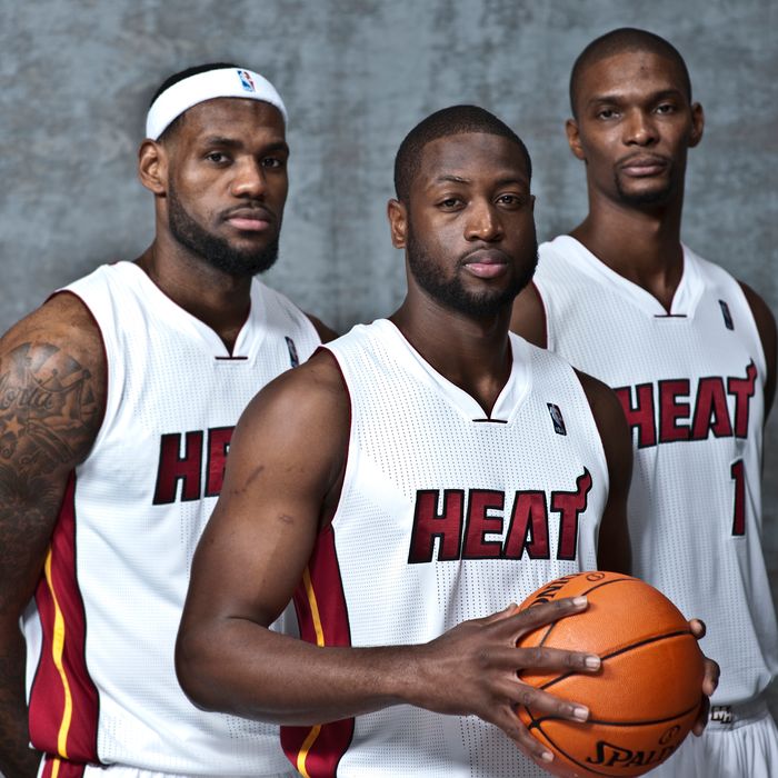 LeBron James #6, Dwyane Wade #3 and Chris Bosh #1 of the Miami Heat poses for a portrait during Media Day on December 12, 2011 at American Airlines Arena in Miami, Florida. 