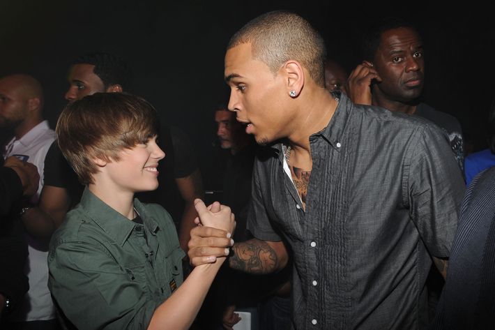 MIAMI - FEBRUARY 06:  Justin Bieber and Chris Brown pose backstage at the BET-SOS Saving Ourselves Help for Haiti Benefit Concert at AmericanAirlines Arena on February 5, 2010 in Miami, Florida.  (Photo by Kevin Mazur/WireImage)