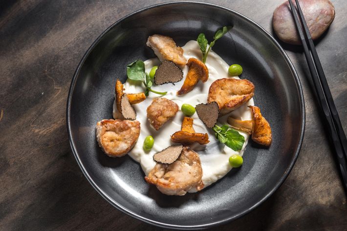 Sweetbreads with chanterelle, cauliflower, white chocolate, edamame, and black truffle mushroom.