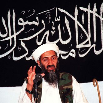 AFGHANISTAN - AUGUST 8: Undated file picture of Saudi dissident Ossama Bin Ladin in an undisclosed place inside Afghanistan. Ossama Bin Ladin speaks while siting in front of a bannar inscribed basic Islamic tenet in Afghanistan. The billionaire Bin Ladin, member of a family of wealthy Saudi construction tycoon, is blamed for two bomb blasts in his home country in 1995-96 that killed 24 US servicemen. AFP PHOTO (Photo credit should read AFP/AFP/Getty Images)