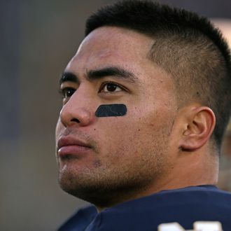 Manti T'eo #5 of the Notre Dame Fighting Irish keeps an eye on the game against the BYU Cougars at Notre Dame Stadium on October 20, 2012 in South Bend, Indiana. Notre Dame defeated BYU 17-14.