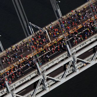 NEW YORK - NOVEMBER 06: Runners cross the Verrazano-Narrows Bridge towards Brooklyn at the start of the ING New York City Marathon as seen from the air on November 6, 2011 in New York City. (Photo by Chris Trotman/Getty Images)