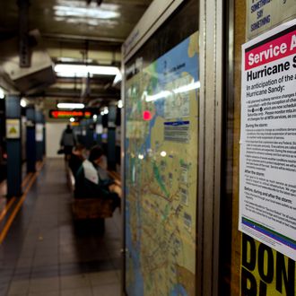 A sign informs subway riders of changes in service in the hours before the arrival of Hurricane Sandy in New York Sunday, Oct. 28, 2012. Areas in the Northeast Region prepared Sunday for the arrival of the hurricane and a possible flooding storm surge. (AP Photo/Craig Ruttle)