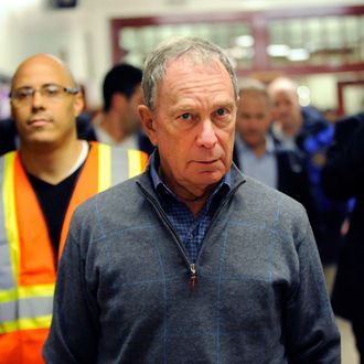 Mayor Michael Bloomberg arrives at Seward Park High School on the lower east side, the site of one of many public shelters set up in preparation of the storm, Sunday, Oct. 28, 2012, in New York. Tens of thousands of people were ordered to evacuate coastal areas Sunday as big cities and small towns across the U.S. Northeast braced for the onslaught of a superstorm threatening some 60 million people along the most heavily populated corridor in the nation. (AP Photo/ Louis Lanzano)