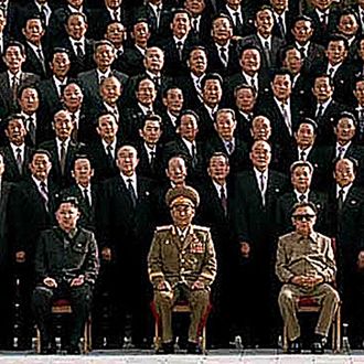 In this detail from a photo released by Korean Central News Agency via Korean News Service on September 30, 2010 North Korean leader Kim Jong-Il (R, front row) and the man believed to be his son Kim Jong-un, (L, front row).