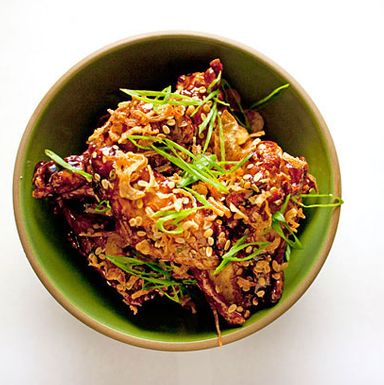 Kalbi glazed chicken wings with crispy garlic and ginger