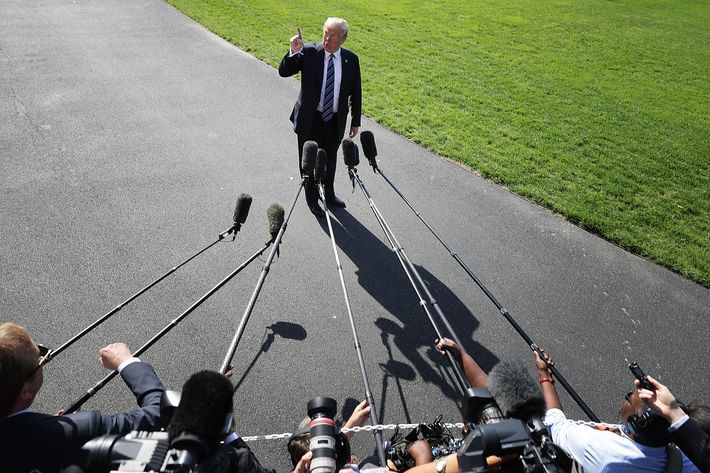 Donald Trump pointing to "Melania."