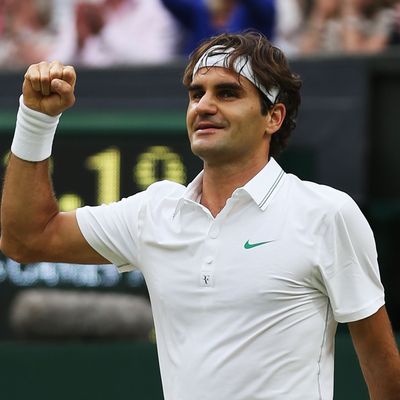 Roger Federer of Switzerland celebrates match point during his Gentlemen's Singles semi final match against Novak Djokovic of Serbia on day eleven of the Wimbledon Lawn Tennis Championships at the All England Lawn Tennis and Croquet Club on July 6, 2012 in London, England. 