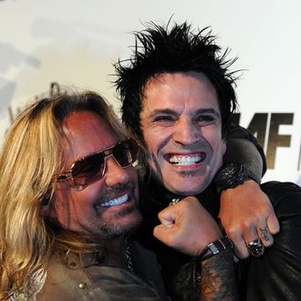 WEST HOLLYWOOD, CA - AUGUST 18: Motley Crue band members (L-R) Vince Neil and Tommy Lee arrive at the Annual Sunset Strip Music Festival, Tribute to Motley Crue at the House of Blues Sunset Blvd on August 18, 2011 in West Hollywood, California. (Photo by Frazer Harrison/Getty Images)