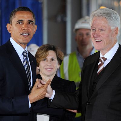 WASHINGTON, DC - DECEMBER 2: (AFP OUT) U.S. President Barack Obama (L) and former President Bill Clinton tour a 