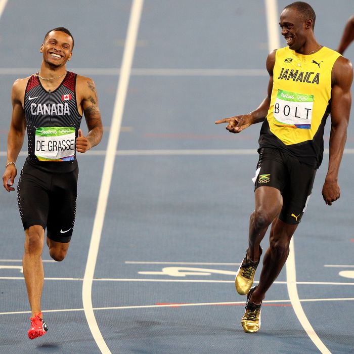 Usain Bolt And Andre De Grasse Smiling In The 200m Semi