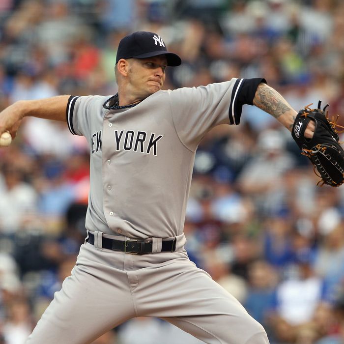 KANSAS CITY, MO - AUGUST 15: Starting pitcher A.J. Burnett #34 of the New York Yankees pitches during the game against the Kansas City Royals at Kauffman Stadium on August 15, 2011 in Kansas City, Missouri. (Photo by Jamie Squire/Getty Images)