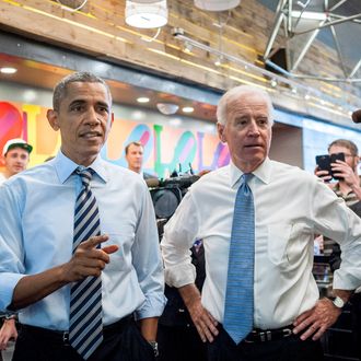 WASHINGTON, DC - OCTOBER 4: U.S. President Barack Obama (L) and Vice President Joe Biden talk to the media at Taylor Gourmet on Pennsylvania Avenue after walking from the White House for a take-out lunch October 4, 2013 in Washington, DC. Democrats and Republicans are still at a stalemate on funding for the federal government as the shutdown goes into the fourth day. The deli, like many other eateries in Washington, is currently offering a discount for furloughed federal workers. (Photo by Pete Marovich-Pool/Getty Images)