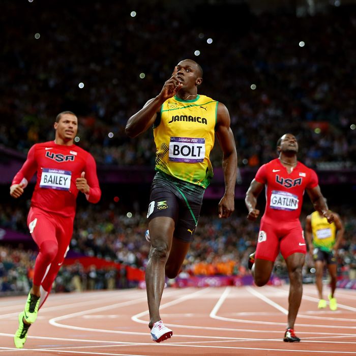Usain Bolt of Jamaica celebrates winning gold in the Mens 100m Final on Day 9 of the London 2012 Olympic Games at the Olympic Stadium on August 5, 2012 in London, England. 
