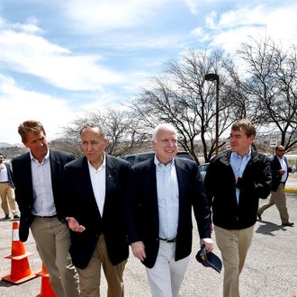 From left, Sen. Jeff Flake, R-Ariz., Sen. Chuck Schumer, D-NY, Sen. John McCain, R-Ariz., and Sen. Michael Bennett, D-Colo, arrive at a news conference after their tour of the Mexico border with the United States on Wednesday, March 27, 2013, in Nogales, Ariz. The senators are part of a larger group of legislators shaping and negotiating details of an immigration reform package vowed Wednesday to make the legislation public when Congress reconvenes next month. (AP Photo/Ross D. Franklin)