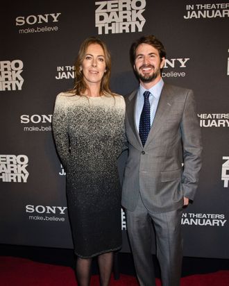 Kathryn Bigelow and Mark Boal pose for photos at the Newseum during the 