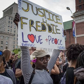 Protestors march in solidarity for Freddie Gray in downtown Baltimore, MD. April 29, 2015. Baltimore remains in unrest following the death of city resident Freddie Gray who was arrested for possessing a switch blade knife and died while in custody of the Baltimore Police.