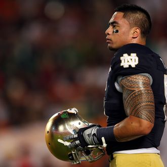 Manti Te'o #5 of the Notre Dame Fighting Irish warms up prior to playing against the Alabama Crimson Tide in the 2013 Discover BCS National Championship game at Sun Life Stadium on January 7, 2013 in Miami Gardens, Florida. 