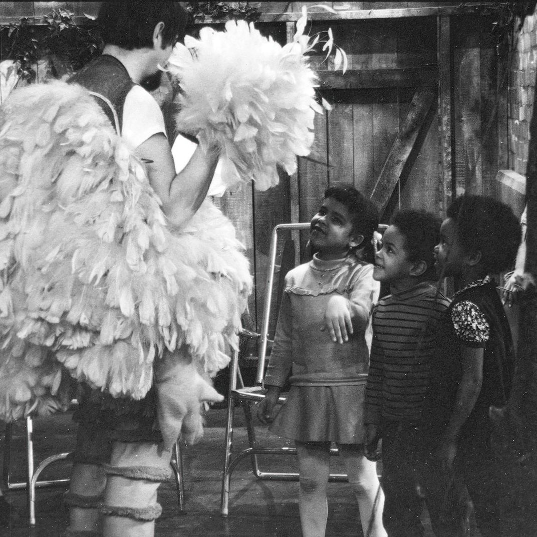 Spinney and young actors on the set.