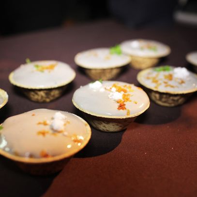 Juni's slow-poached Feather Ridge hen's egg with black truffle, truffle powder, and chervil.