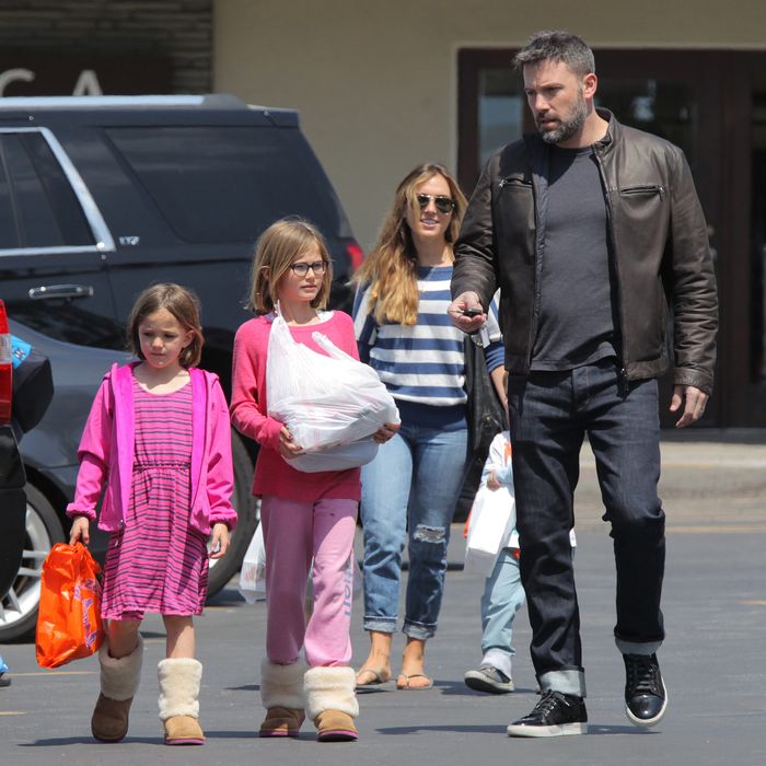 Ben Affleck with his children and their former nanny.