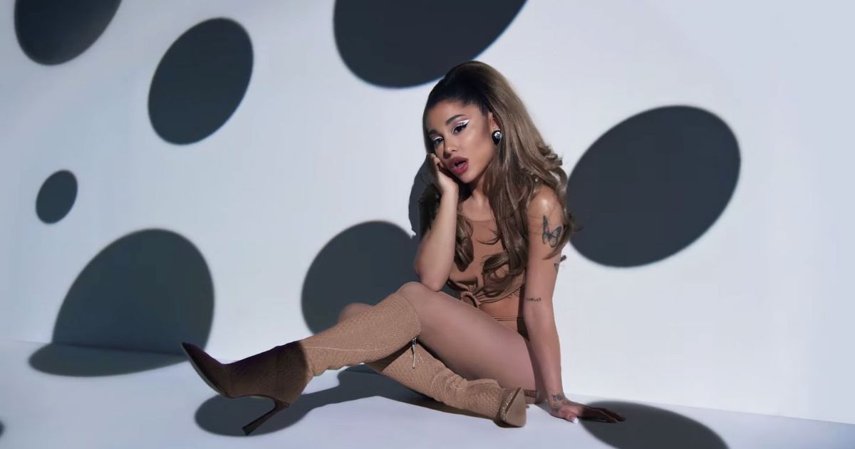 Ariana Grande poses in nothing but body paint to promote new album