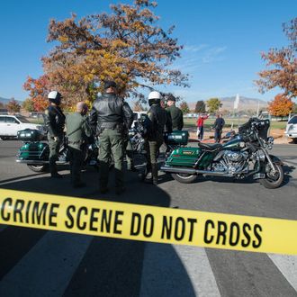 Police secure the scene near Sparks Middle School after a shooting in Sparks, Nev., on Monday, Oct. 21, 2013. Authorities are reporting that two people were killed and two wounded at the Nevada middle school. 