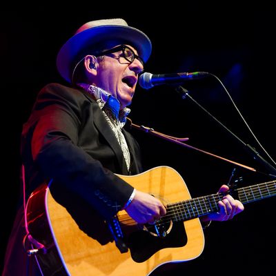 TILBURG, NETHERLANDS - JULY 19: Elvis Costello performs on stage at 013 on July 19, 2013 in Tilburg, Netherlands. (Photo by Dimitri Hakke/Redferns via Getty Images)