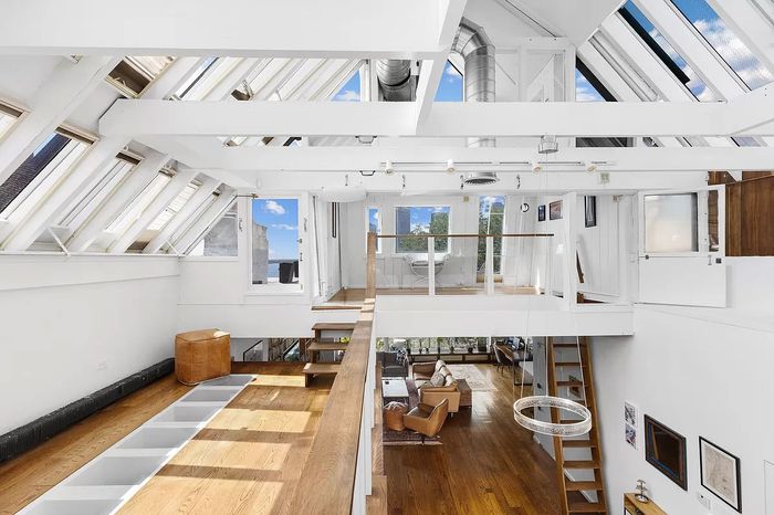 Mailer added this skylight and gangway, replete with nautical details, including a vintage door (right) and a porthole that's just out of frame in this listing photo.