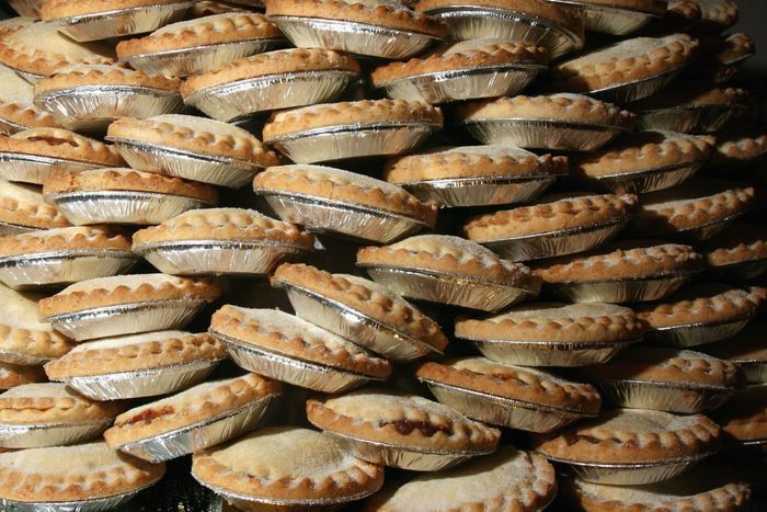 A full-screen stack of pies