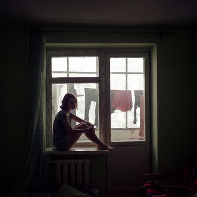 Woman in window.