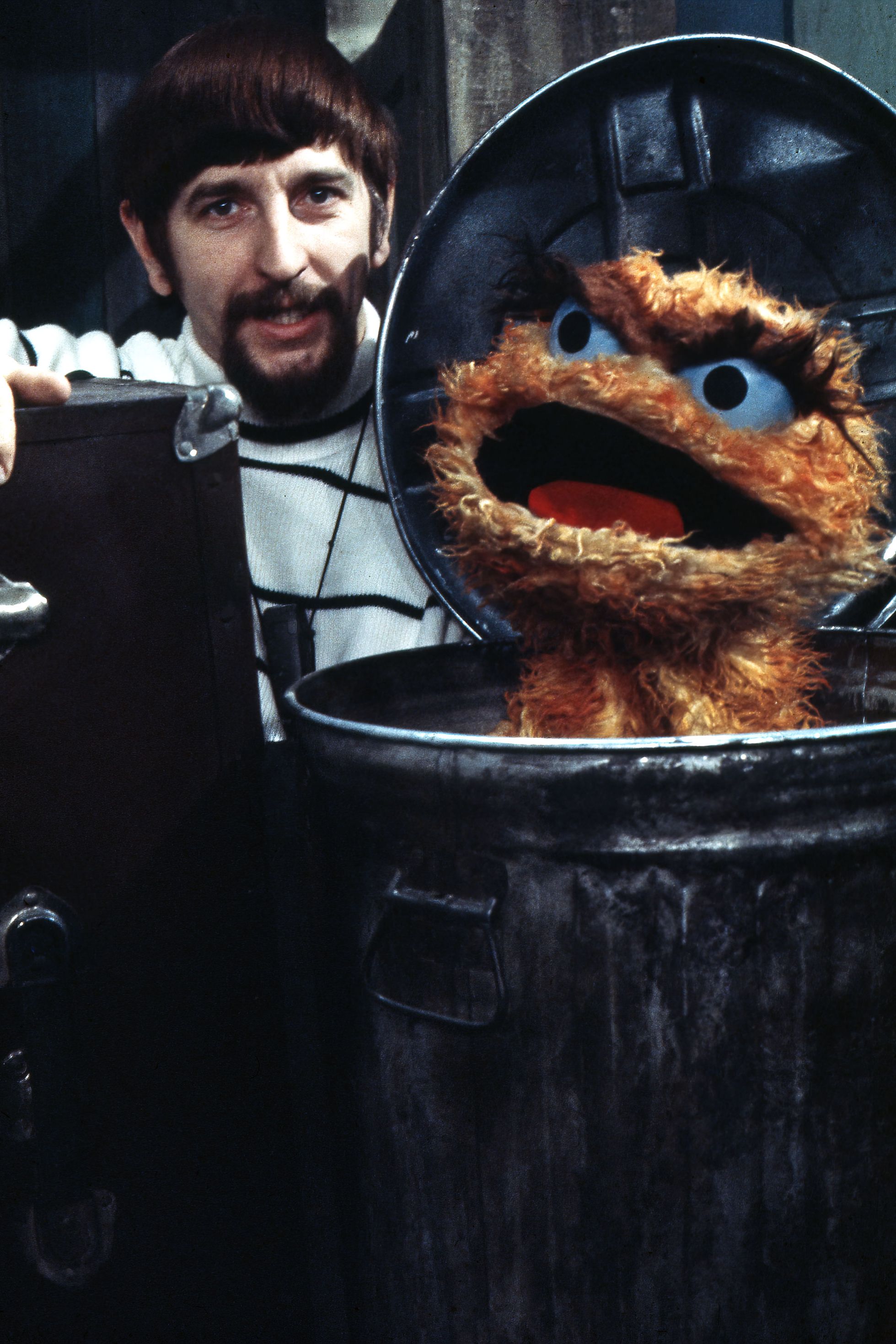 Oscar the Grouch was orange before he turned green.