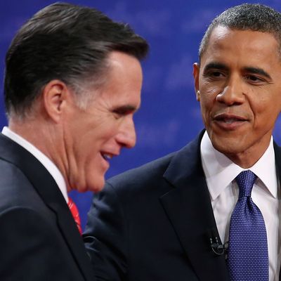 DENVER, CO - OCTOBER 03: Democratic presidential candidate, U.S. President Barack Obama (R) and Republican presidential candidate, former Massachusetts Gov. Mitt Romney speak after the Presidential Debate at the University of Denver on October 3, 2012 in Denver, Colorado. The first of four debates for the 2012 Election, three Presidential and one Vice Presidential, is moderated by PBS's Jim Lehrer and focuses on domestic issues: the economy, health care, and the role of government. (Photo by Chip Somodevilla/Getty Images)