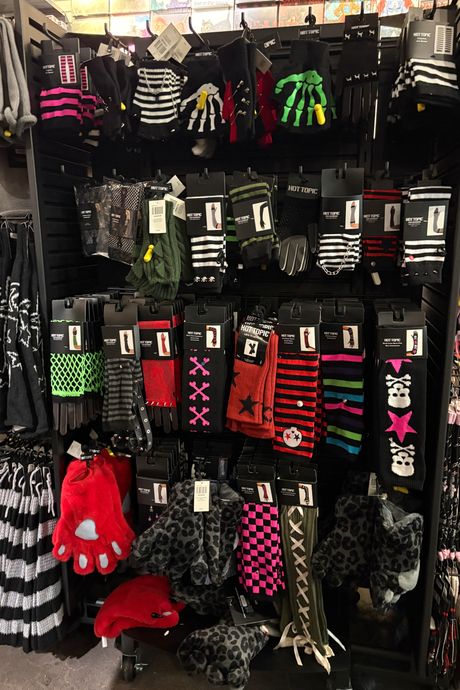 Armwarmers and legwarmers patterned with stripes, mesh, paw prints, crosses.
