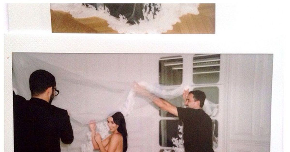 Kim Kardashian Posed in Nothing But a Sheer Veil and Stockings
