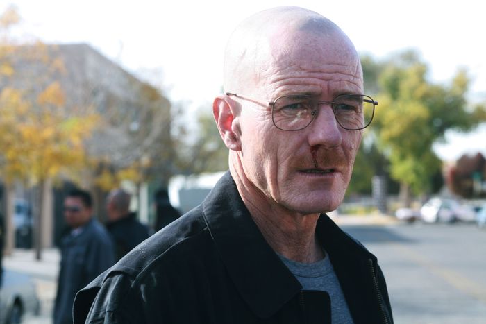 brian cranston as walter white, looking perhaps dismayed, with a bloody nose