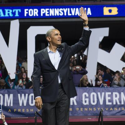US President Barack Obama arrives to speak at a campaign rally for Tom Wolf, Democratic candidate for Pennsylvania Governor, at the Liacouras Center at Temple University in Philadelphia, Pennsylvania, November 2, 2014. 