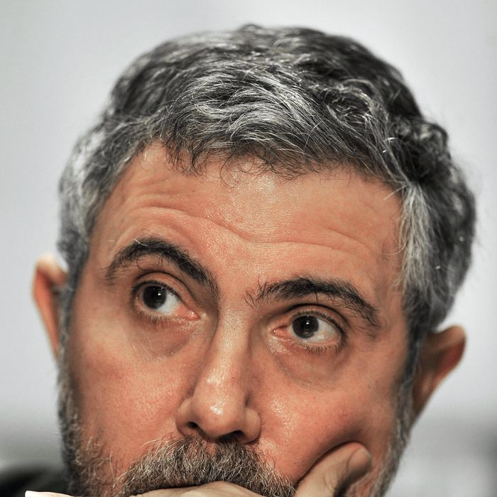 Professor of Economics and International Affairs at Princeton University, New York Times columnist, and 2008 Nobel Peace Prize winner in Economics, Paul Krugman, listens to his introduction before delivering remarks February 11, 2009 at the Institute for America's Future 