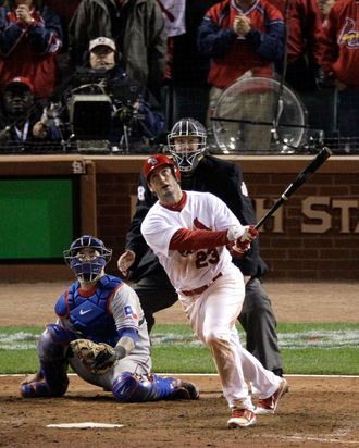 ST LOUIS, MO - OCTOBER 27: David Freese #23 of the St. Louis Cardinals hits a walk off solo home run in the 11th inning to win Game Six of the MLB World Series against the Texas Rangers at Busch Stadium on October 27, 2011 in St Louis, Missouri. The Cardinals won 10-9. (Photo by Rob Carr/Getty Images)