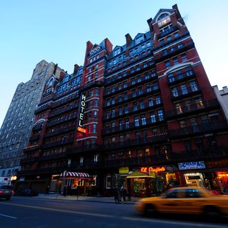 A view of the front of the Chelsea Hotel in New York, January 10, 2011. The Chelsea Hotel, a haven for struggling artists for over 50 years, is for sale since October 2010. The 12-floor, 250-room landmark hotel, was built in 1883 and hosted celebrities such as Andy Warhol, Arthur Miller and his wife Marylin Monroe, musicians Janis Joplin, Jimi Hendrix, Jim Morrison and punk rocker Sid Vicious of the Sex Pistols who killed his girlfriend Nancy Spungen there in 1978 in a drug-induced stupor. AFP PHOTO/Emmanuel Dunand (Photo credit should read EMMANUEL DUNAND/AFP/Getty Images)