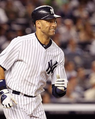 New York Yankees' Derek Jeter watches the game during the sixth