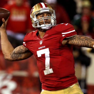 Quarterback Colin Kaepernick #7 of the San Francisco 49ers throws the ball against the Green Bay Packers during the NFC Divisional Playoff Game at Candlestick Park on January 12, 2013 in San Francisco, California.