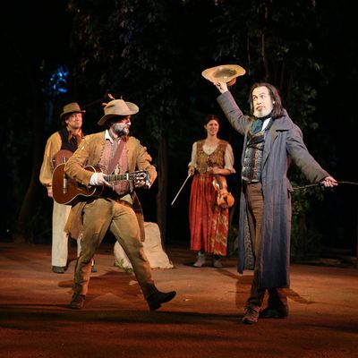Jordan Tice and Stephen Spinella (foreground) in the Shakespeare in the Park production of As You Like It, directed by Daniel Sullivan, running as part of The Public Theater's Shakespeare in the Park