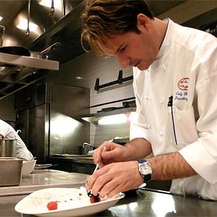 Hopson, at work in his full-time kitchen.