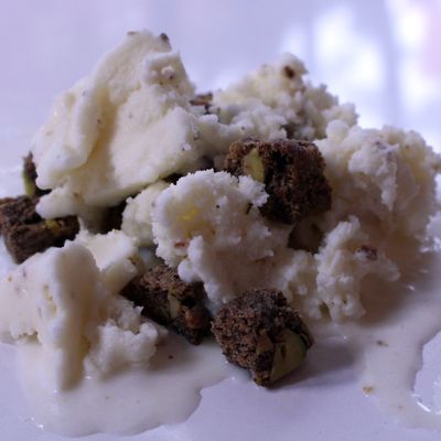 Here's Ivan Ramen's salted-yuzu ice cream with scooped-in buckwheat cookies.