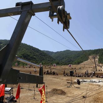 In this Aug. 23, 2013 photo, North Korean soldiers work on at building project to construct a ski resort at North Korea's Masik Pass. North Korean authorities have been encouraging a broader interest in sports in the country, both at the elite and recreational levels, as a means of energizing and mobilizing the masses, which North Korea’s slogan spinners are calling 