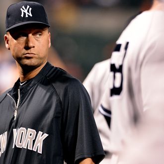 Shortstop Derek Jeter #2 of the New York Yankees looks on during an MLB game against the Baltimore Orioles at Oriole Park at Camden Yards on September 11, 2013 in Baltimore, Maryland.