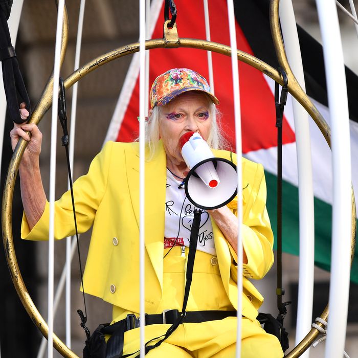 Vivienne Westwood Leads Protest in a Giant Bird Cage