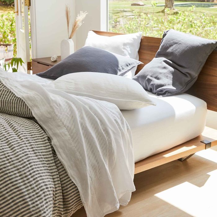 A bed made with linen sheets — the Strategist reviews the best linen bedsheets.