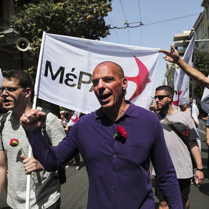 Former Greek Finance Minister Yanis Varoufakis (C) takes part in a rally during May Day celebrations in Athens, Greece, on 01 May 2018. 